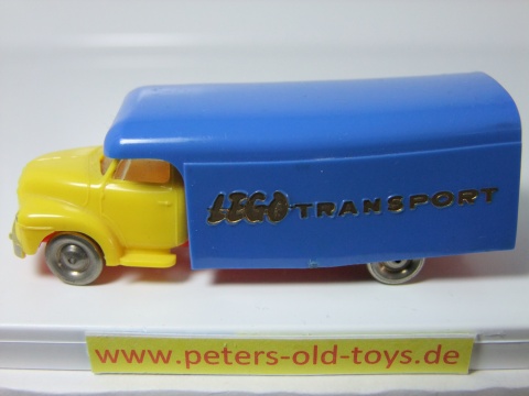 1257-14 Ausführung international, 2.Ausführung Aufbau mit Bedruckung " LEGO TRANSPORT " in gold, Blinker auf Kotflügel,Fahrerhaus:gelb, Aufbau:blau, Chassis: rot