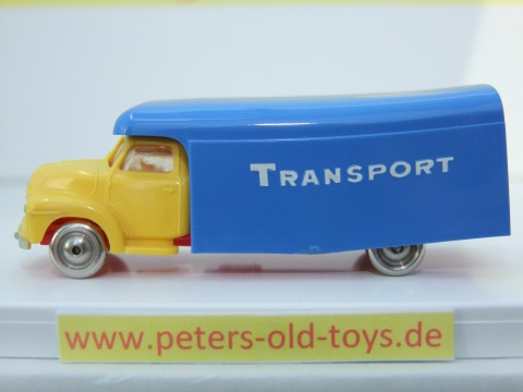 1257-02 Ausführung Dänemark, Aufbau mit Bedruckung " TRANSPORT " in weiss, Blinker auf den Kotflügeln, Fahrerhaus:gelb, Aufbau:blau, Chassis: rot